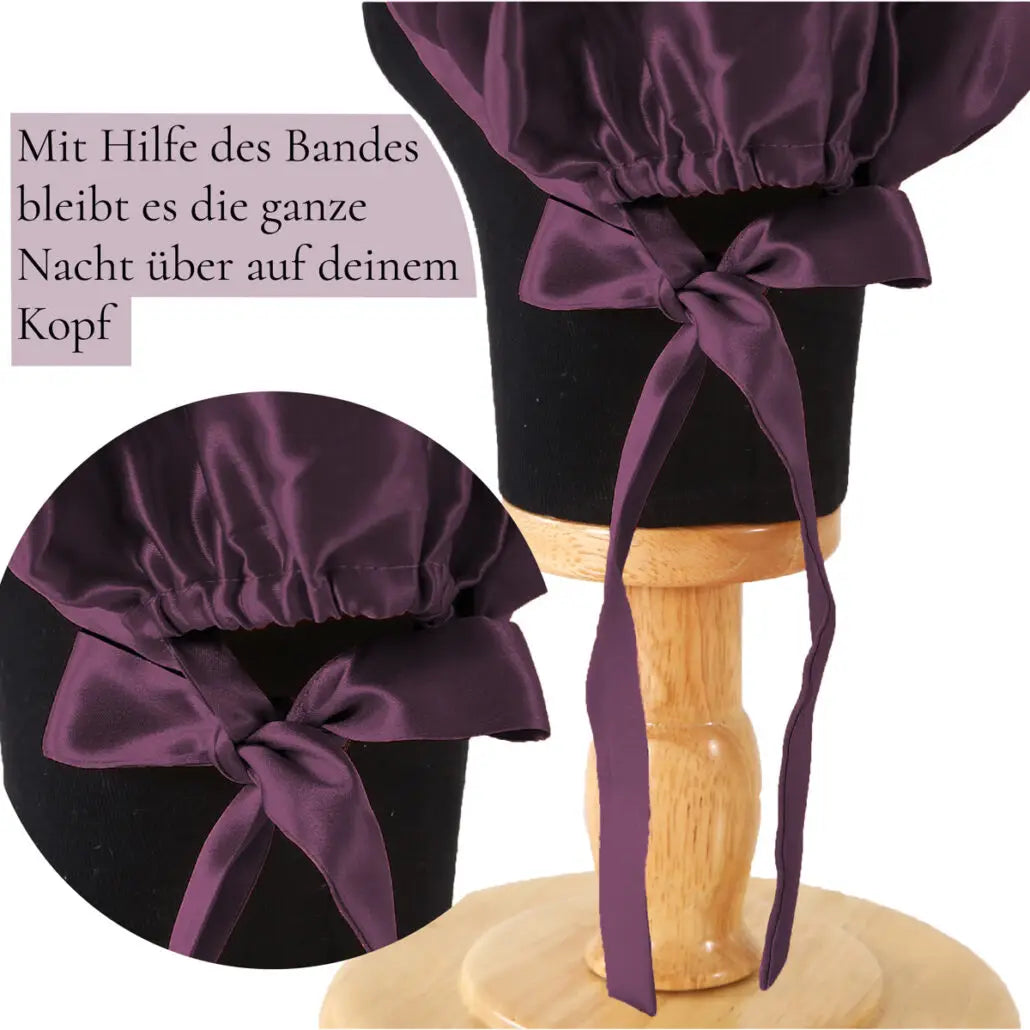 Violette Seidenhaube mit Bändern