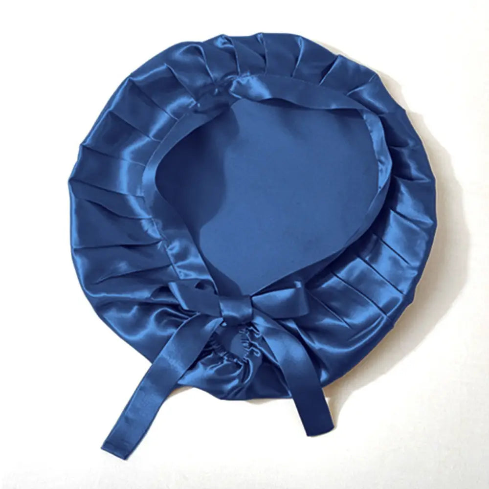 Blaue Seidenhaube mit Bändern und Tiem für luxuriösen Schutz der Haare