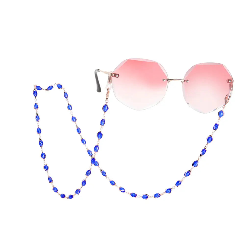 Pink getönte Sonnenbrille mit blauer Perlenkette für Brille in der Brillenkette Halskette für Brille blaue Rose