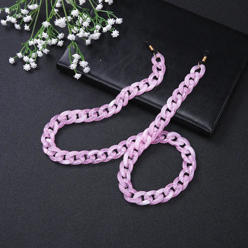 Helle rosa Acrylbrillenkette als modisches Brillenzubehör