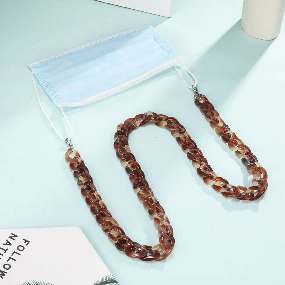 Braune weiße marmorierte Maschenkette für Brille Helder Bernstein