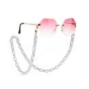 Pink getönte, facettierte Sonnenbrille mit weißer Brillenkette für Damen