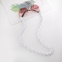 Rimlose pinke Sonnenbrille mit weißer Kette für Brille Brillenkette Halskette für Brille