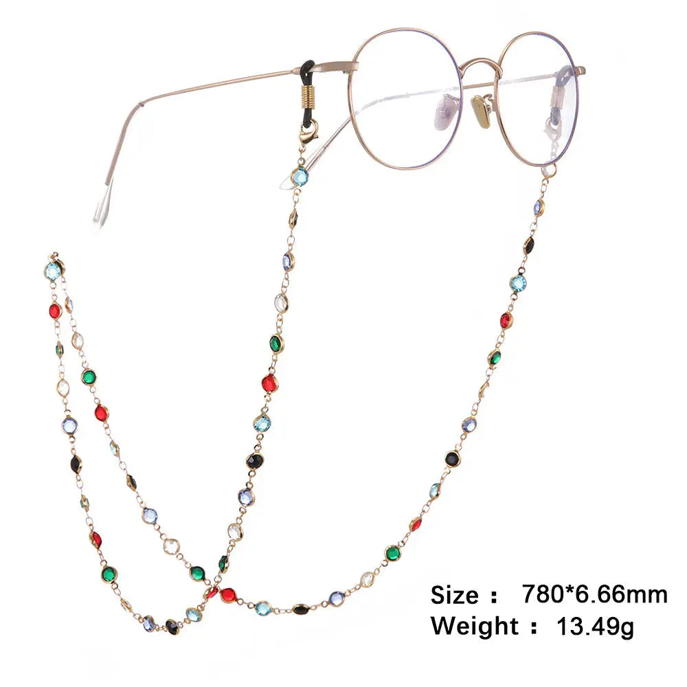 Runde Brillengestelle mit buntem, goldenem Juwelen-Perlenhalsband