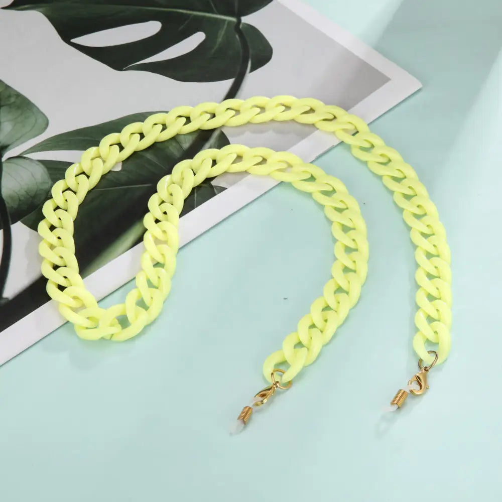 Neon gelbe Brillenkette Halskette Halter für Sonnenbrillen an sonnigem Tag