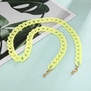 Neon gelbe Brillenkette Halskette Halter für Sonnenbrillen an sonnigem Tag
