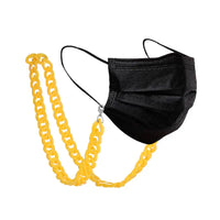 Schwarze Gesichtsmaske mit gelber Kette für Brille im Produkt Brillenkette Halskette halter
