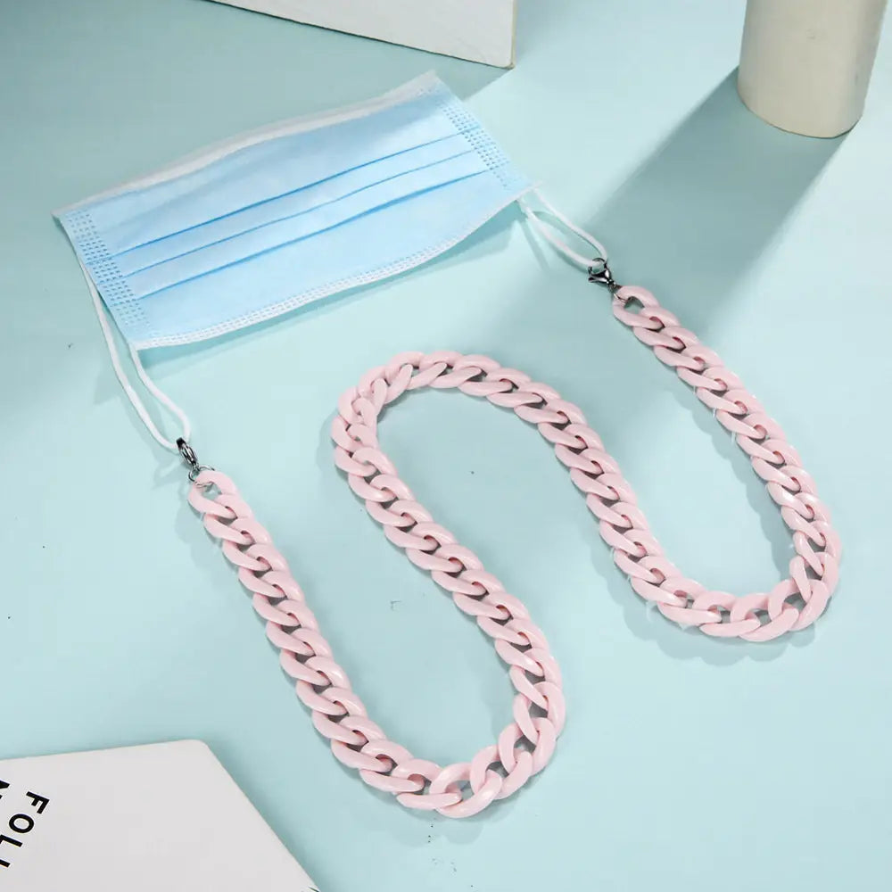 Hellblaue Gesichtsmaske mit pinker Kettenlasche für Brille, Brillenkette Halskette