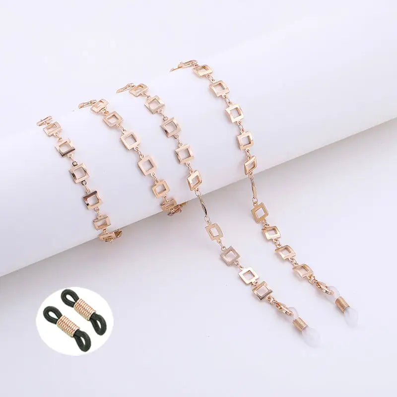 Goldene Brillenkette mit quadratischen Gliedern für Halterbrillen im Rose-Ton