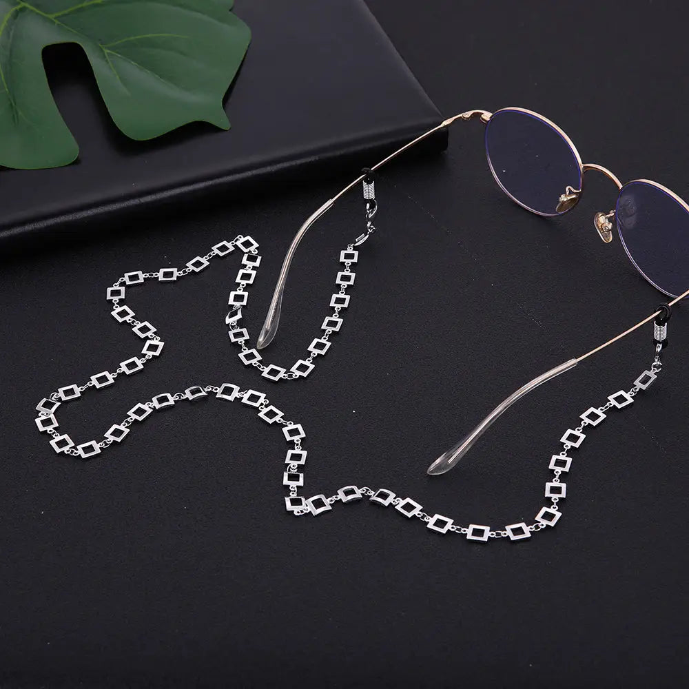 Rimless Sonnenbrille mit Silberkette und quadratischem Rahmen for modisches Accessoire