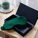 Dunkelgrüne Schlaf-Seidenmaske in schwarzer Geschenkbox, lichtblockend und elegant