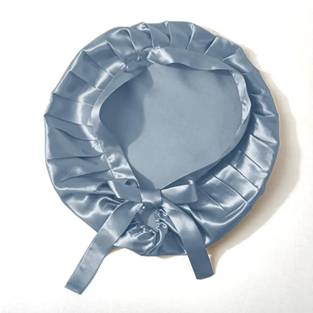 Hellblaue Seidenhaube mit Bändern, satinartig und mit Bindebändern für Schutz